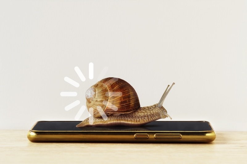 Snail with loading sign on smartphone - Concept of slow Internet speed and slow progress loading bar